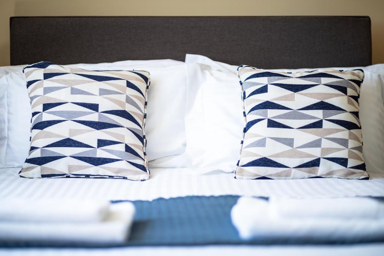Sleepy Puffin Guest House เท็นบี ภายนอก รูปภาพ
