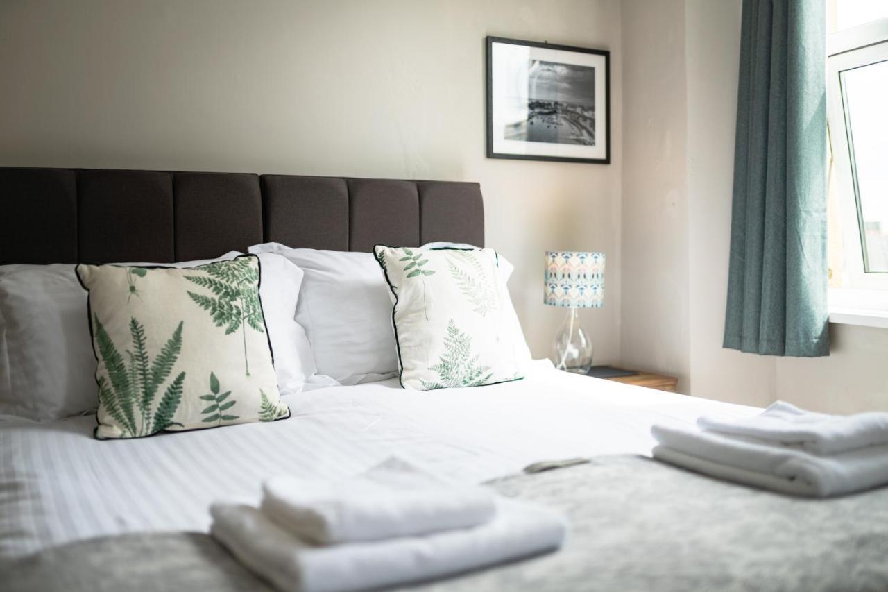 Sleepy Puffin Guest House เท็นบี ภายนอก รูปภาพ