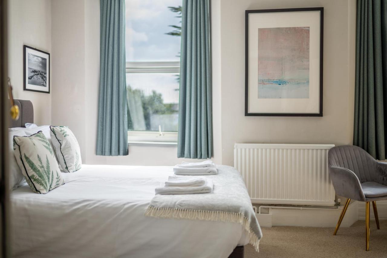 Sleepy Puffin Guest House เท็นบี ภายนอก รูปภาพ